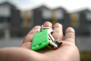 A person holding keys